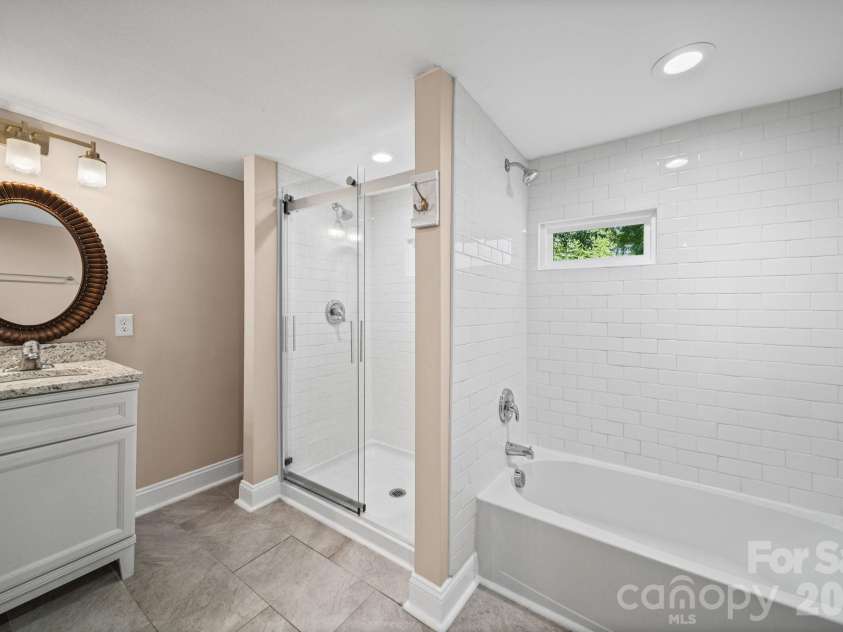 703 Windsor Street, Monroe, NC 28112.  MLS# CAR4412570, YatesRealty ID 43195. Primary bathroom