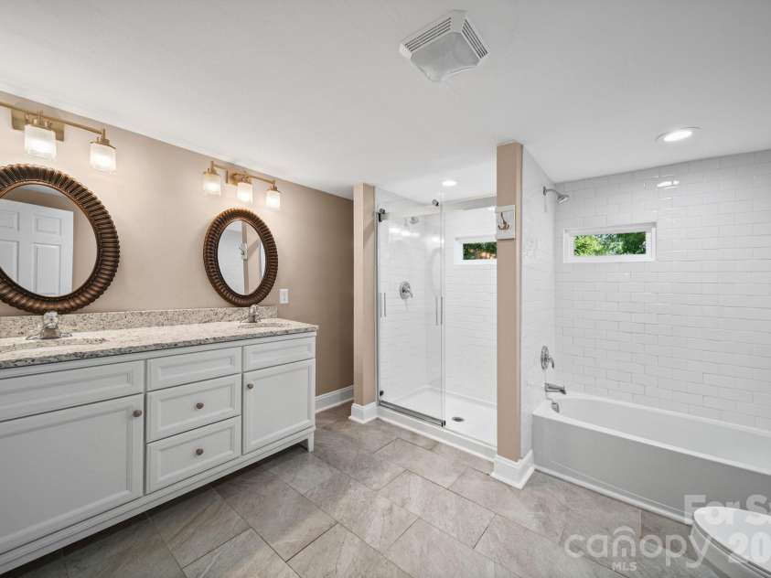 703 Windsor Street, Monroe, NC 28112.  MLS# CAR4412570, YatesRealty ID 43195. Primary bathroom