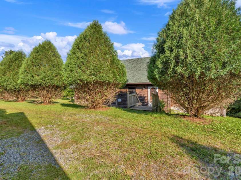 525 Schoolhouse Ridge, Boone, NC 28607.  MLS# CAR4410636, YatesRealty ID 43202. Entry & flat parking area adjacent to detached garage