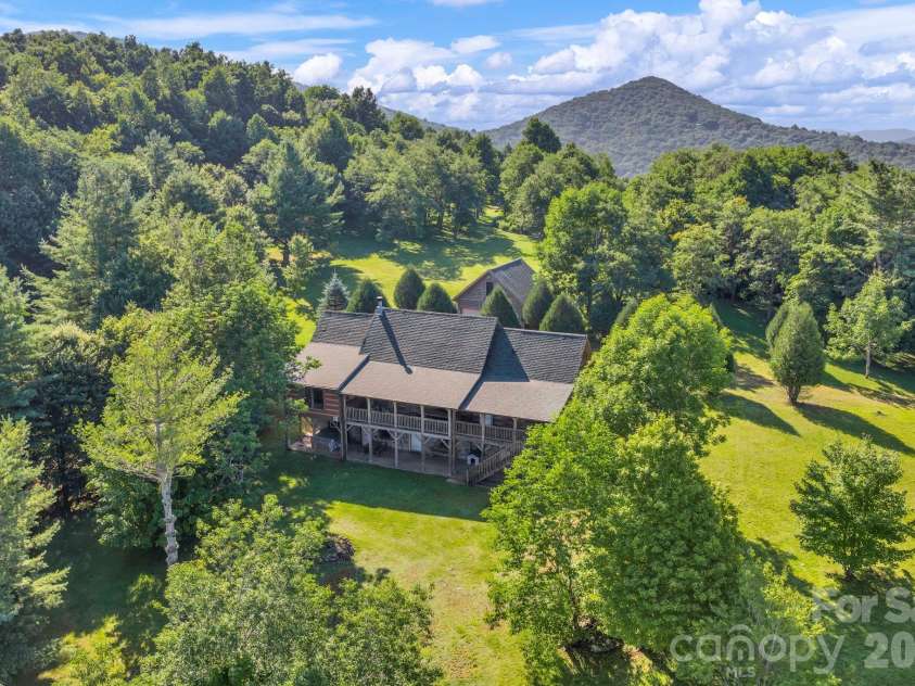525 Schoolhouse Ridge, Boone, NC 28607.  MLS# CAR4410636, YatesRealty ID 43202. Flat pastures and long-range, layered Blue Ridge Mountain Views!