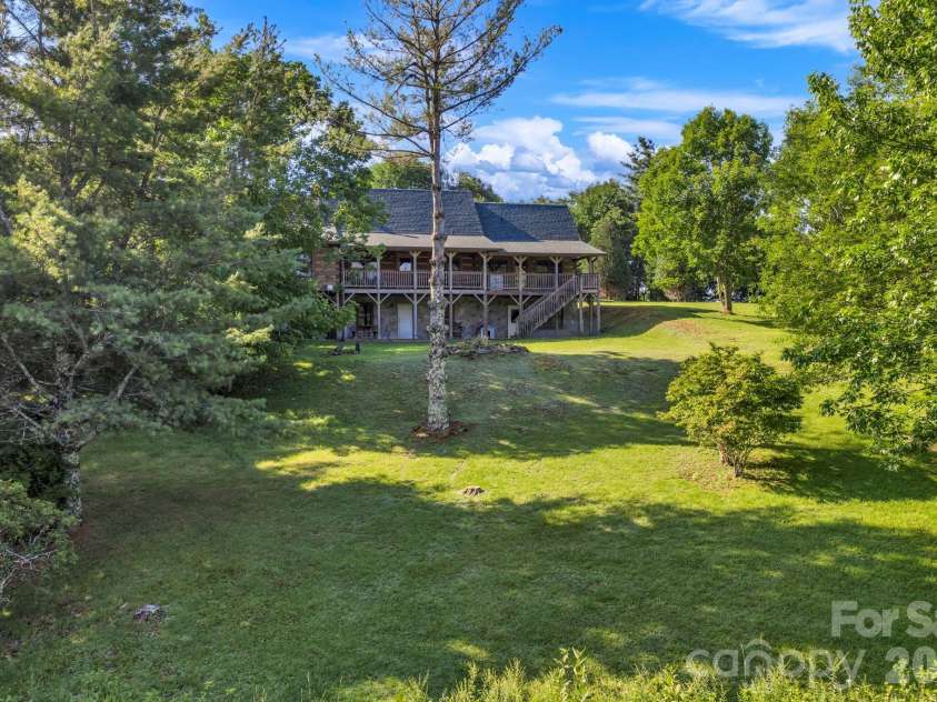 525 Schoolhouse Ridge, Boone, NC 28607.  MLS# CAR4410636, YatesRealty ID 43202. Flat, usable yards & pasture areas