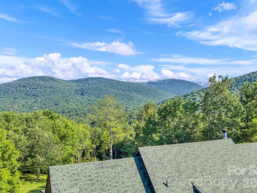 525 Schoolhouse Ridge, Boone, NC 28607.  MLS# CAR4410636, YatesRealty ID 43202. Long-range, layered Blue Ridge Mountain Views!