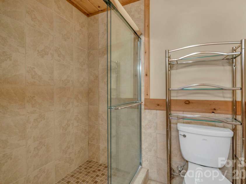 525 Schoolhouse Ridge, Boone, NC 28607.  MLS# CAR4410636, YatesRealty ID 43202. Lower-level bedroom suite full bath