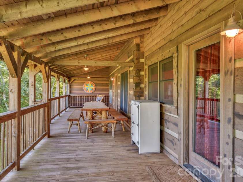 525 Schoolhouse Ridge, Boone, NC 28607.  MLS# CAR4410636, YatesRealty ID 43202. Main-level full deck with VIEWS!