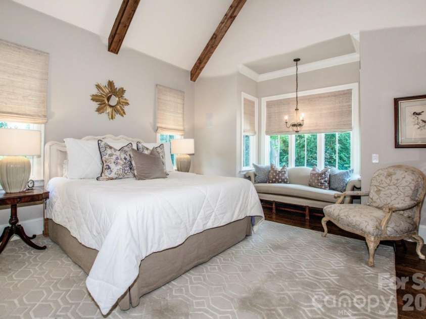 216 Catawba Avenue, Davidson, NC 28036.  MLS# CAR4412213, YatesRealty ID 43205. Primary BR with a vaulted ceiling with beams and a bay window
