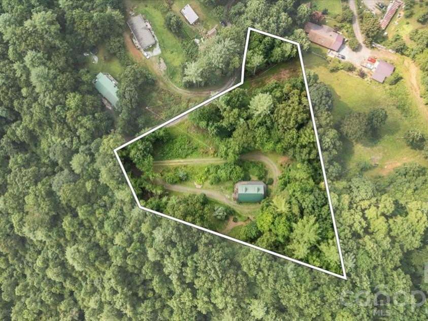 149 Charlie Mac Drive, Burnsville, NC 28714.  MLS# CAR4411134, YatesRealty ID 43209. 