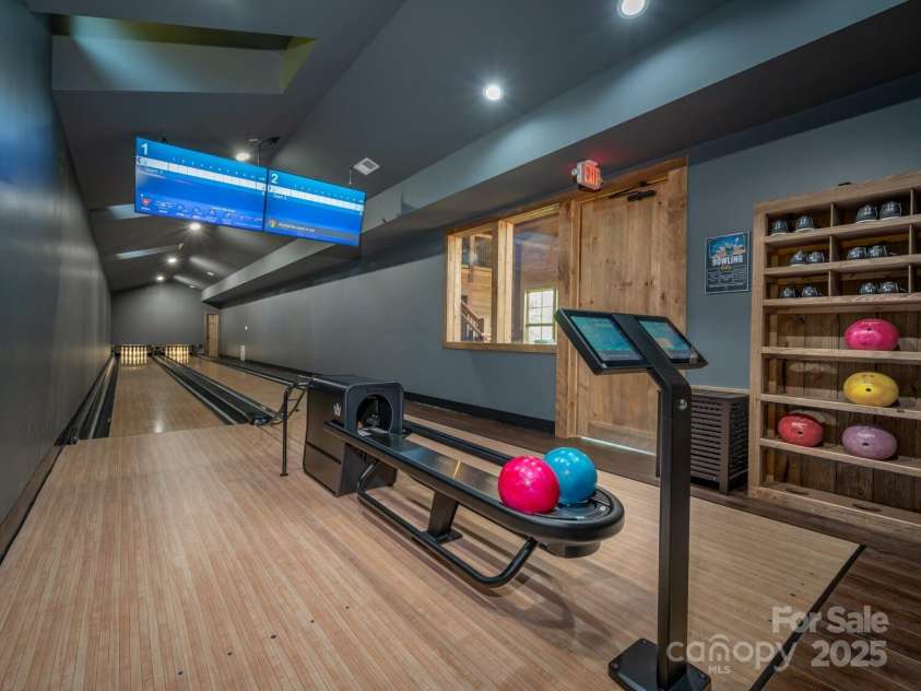 305 Clubhouse Lane, Mill Spring, NC 28756.  MLS# CAR4311469, YatesRealty ID 4321. 2 lane bowling alley in Fitness center