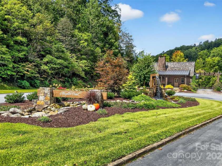 305 Clubhouse Lane, Mill Spring, NC 28756.  MLS# CAR4311469, YatesRealty ID 4321. Entrance to Bright's Creek