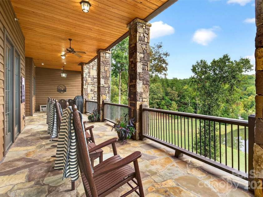 305 Clubhouse Lane, Mill Spring, NC 28756.  MLS# CAR4311469, YatesRealty ID 4321. Impressive stone Columns