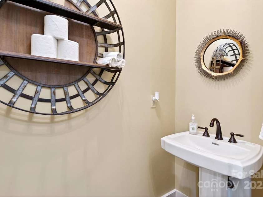 305 Clubhouse Lane, Mill Spring, NC 28756.  MLS# CAR4311469, YatesRealty ID 4321. Powder Room