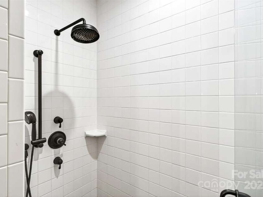 305 Clubhouse Lane, Mill Spring, NC 28756.  MLS# CAR4311469, YatesRealty ID 4321. Primary Shower