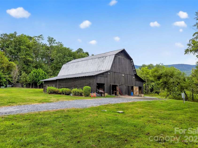 305 Clubhouse Lane, Mill Spring, NC 28756.  MLS# CAR4311469, YatesRealty ID 4321. Scenic barn in the Comminty