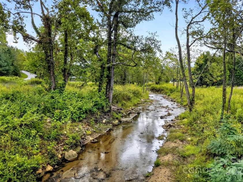 305 Clubhouse Lane, Mill Spring, NC 28756.  MLS# CAR4311469, YatesRealty ID 4321. The famous Bright's Creek