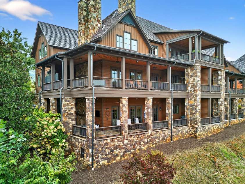 305 Clubhouse Lane, Mill Spring, NC 28756.  MLS# CAR4311469, YatesRealty ID 4321. Unit is lower level on the left