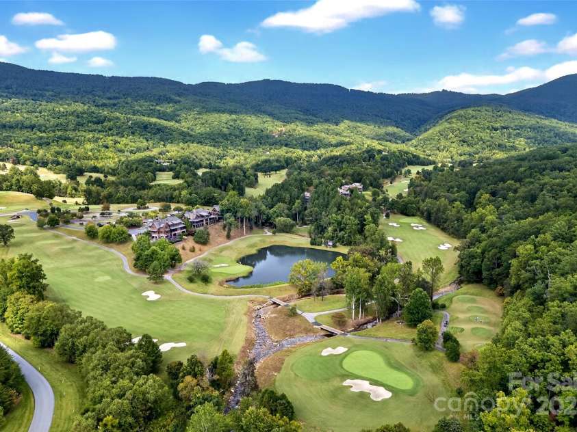 305 Clubhouse Lane, Mill Spring, NC 28756.  MLS# CAR4311469, YatesRealty ID 4321. Unit overlooks the 19th hole