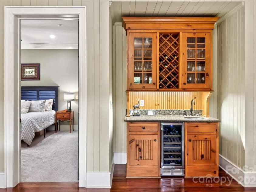 305 Clubhouse Lane, Mill Spring, NC 28756.  MLS# CAR4311469, YatesRealty ID 4321. Wet bar with wine fridge