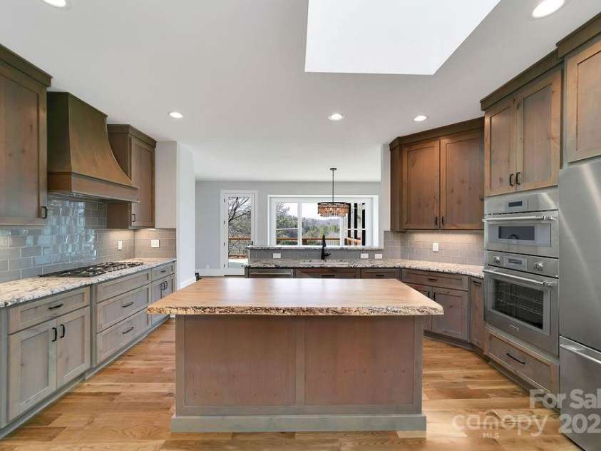 5039 Connestee Trail, Brevard, NC 28712.  MLS# CAR4324412, YatesRealty ID 4322. 