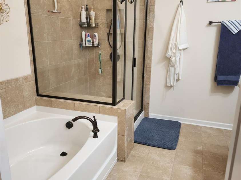 1035 Crescent Moon Drive, Fort Mill, SC 29715.  MLS# CAR4201241, YatesRealty ID 4323. Large garden tub and oversized tile shower