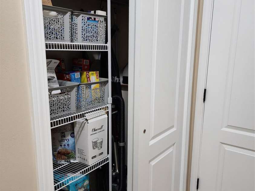 1035 Crescent Moon Drive, Fort Mill, SC 29715.  MLS# CAR4201241, YatesRealty ID 4323. Large storage closet in laundry room.