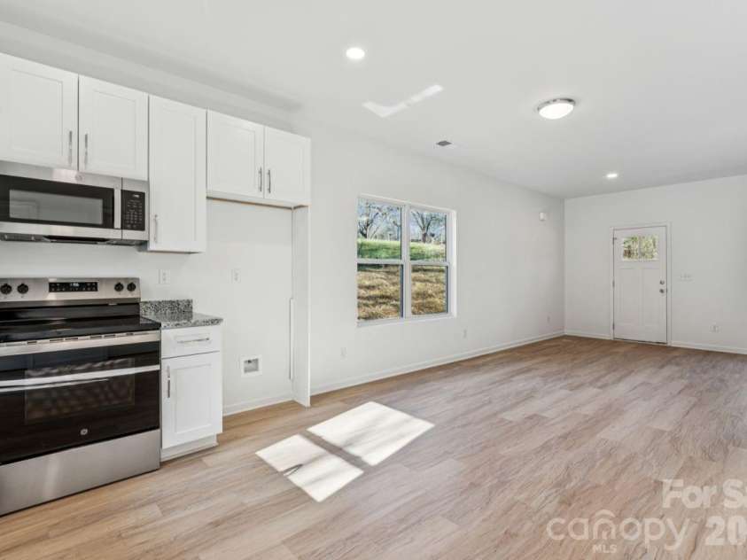 709 Hillsdale Drive, Cherryville, NC 28021.  MLS# CAR4333848, YatesRealty ID 4323. Kitchen & Dining Area