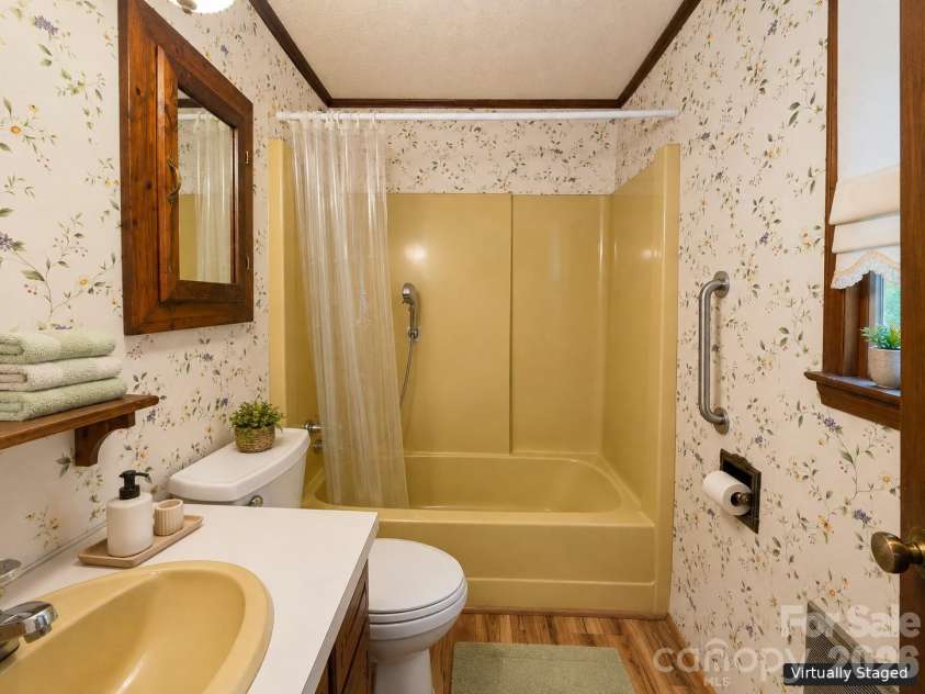 2027 Stamey Branch Road, Newland, NC 28657.  MLS# CAR4411360, YatesRealty ID 43230. Main Floor Bathroom