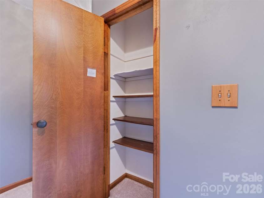 37 George Circle, Maggie Valley, NC 28751.  MLS# CAR4352732, YatesRealty ID 4324. Linen closet on upper level