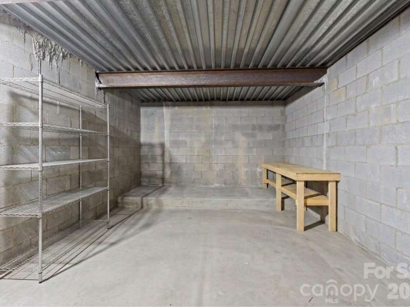 49 Timber Moss Drive, Asheville, NC 28804.  MLS# CAR4413689, YatesRealty ID 43247. Basement Storage Room