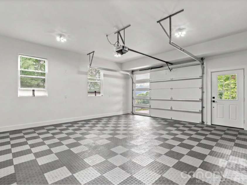 49 Timber Moss Drive, Asheville, NC 28804.  MLS# CAR4413689, YatesRealty ID 43247. Garage ( Basement)