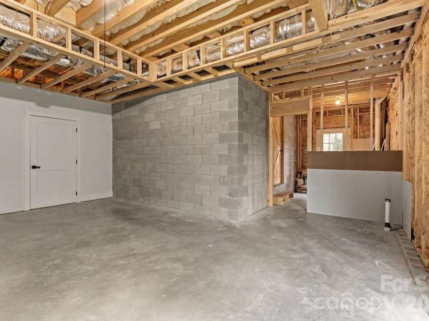 49 Timber Moss Drive, Asheville, NC 28804.  MLS# CAR4413689, YatesRealty ID 43247. Unfinished Basement