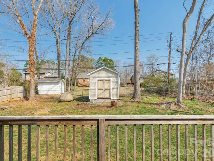 7015 Hunters Glen Drive, Charlotte, NC 28214.  MLS# CAR4354629, YatesRealty ID 4325. Deck looking at Shed