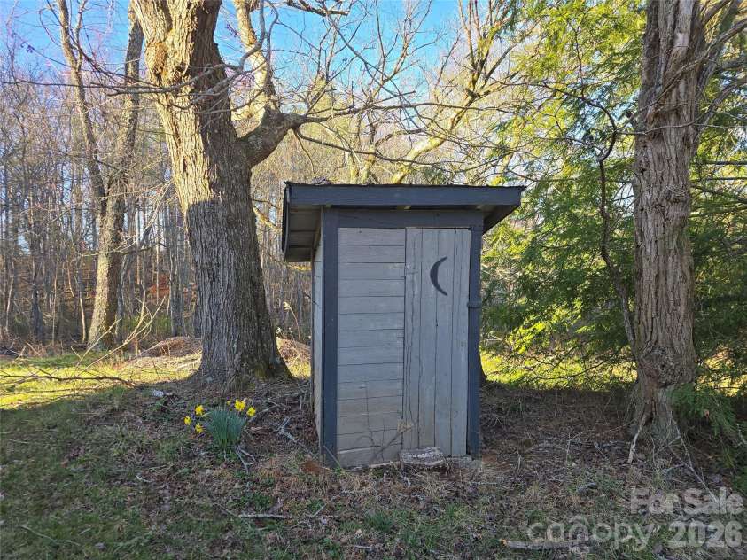 117 Woods View Trail, Fairview, NC 28730.  MLS# CAR4289341, YatesRealty ID 4326. Cool old Outhouse.