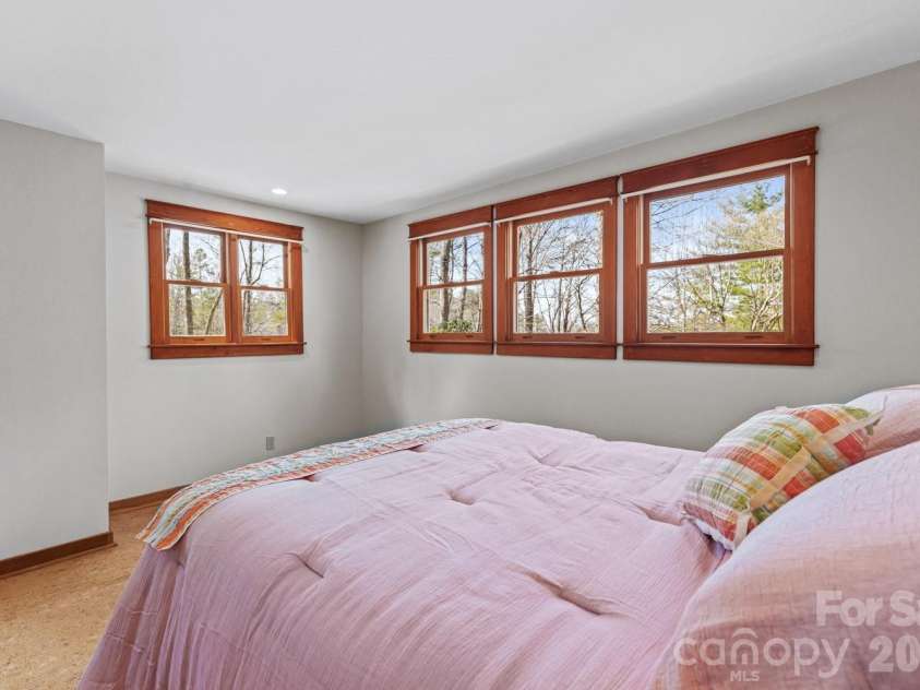 117 Woods View Trail, Fairview, NC 28730.  MLS# CAR4289341, YatesRealty ID 4326. Primary suite with wonderful views.