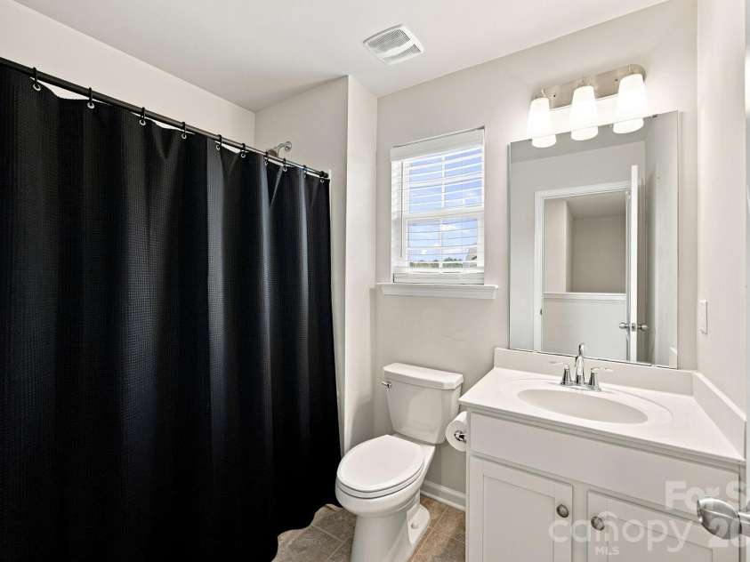 111 Slip Shot Lane, Troutman, NC 28166.  MLS# CAR4409277, YatesRealty ID 43263. Guest bathroom #1