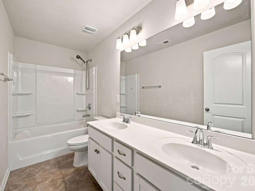 111 Slip Shot Lane, Troutman, NC 28166.  MLS# CAR4409277, YatesRealty ID 43263. Guest Bathroom #2