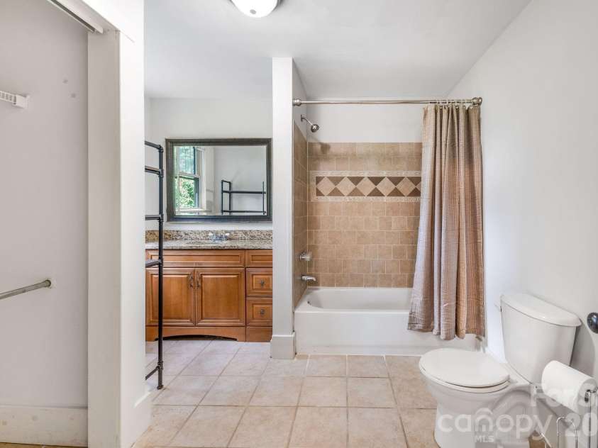 181 Courtland Place, Asheville, NC 28801.  MLS# CAR4412057, YatesRealty ID 43266. Lower Level Bath