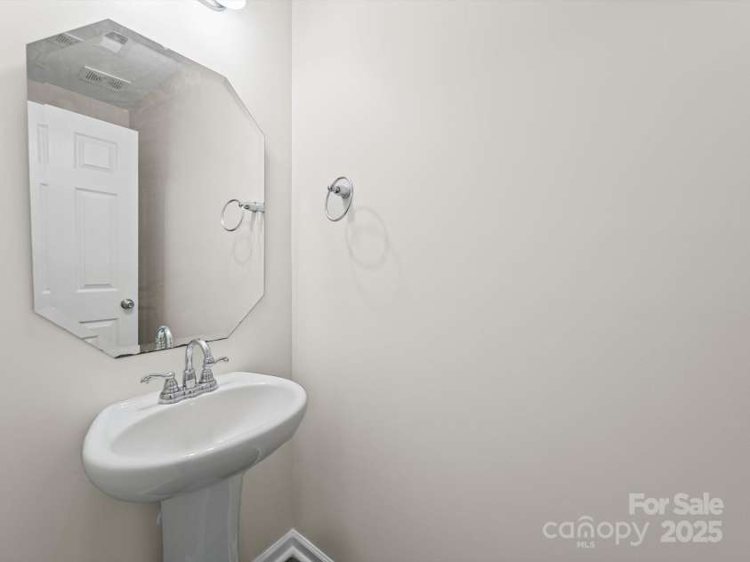 303 Amberly Circle, Pageland, SC 29728.  MLS# CAR4294415, YatesRealty ID 4327. 1/2 bath downstairs