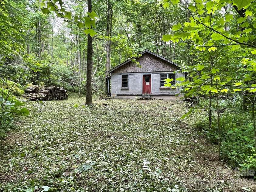 11820 State Highway 197 None, Burnsville, NC 28714.  MLS# CAR4361190, YatesRealty ID 43270. Block structure near creek