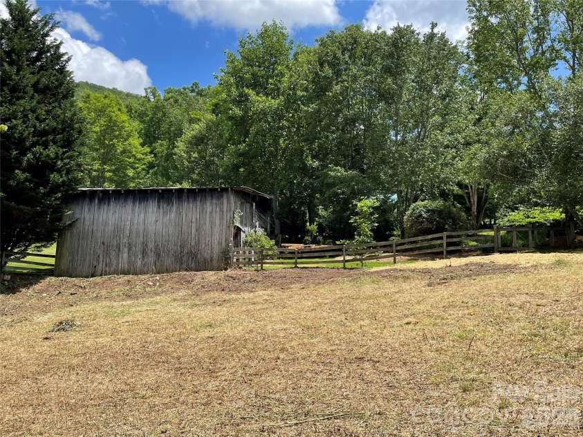 11820 State Highway 197 None, Burnsville, NC 28714.  MLS# CAR4361190, YatesRealty ID 43270. Pasture adjacent to barn
