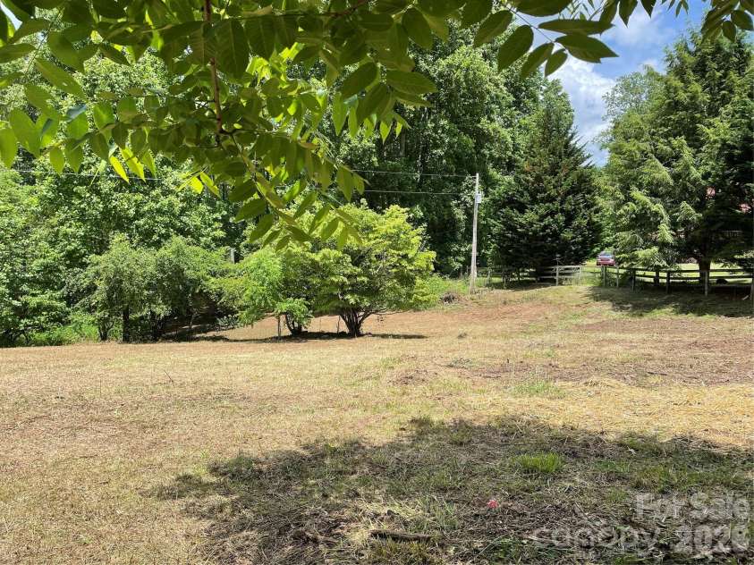 11820 State Highway 197 None, Burnsville, NC 28714.  MLS# CAR4361190, YatesRealty ID 43270. Small fenced pasture