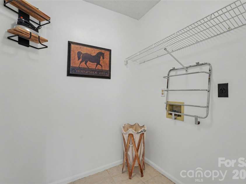 17205 Asti Court, Cornelius, NC 28031.  MLS# CAR4406087, YatesRealty ID 43276. Upper level laundry room.