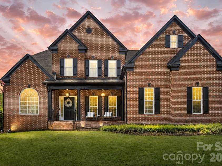 2519 Fallbrook Place, Concord, NC 28027.  MLS# CAR4319310, YatesRealty ID 43283. Front exterior at dusk. *Photo has been virtually enhanced.*
