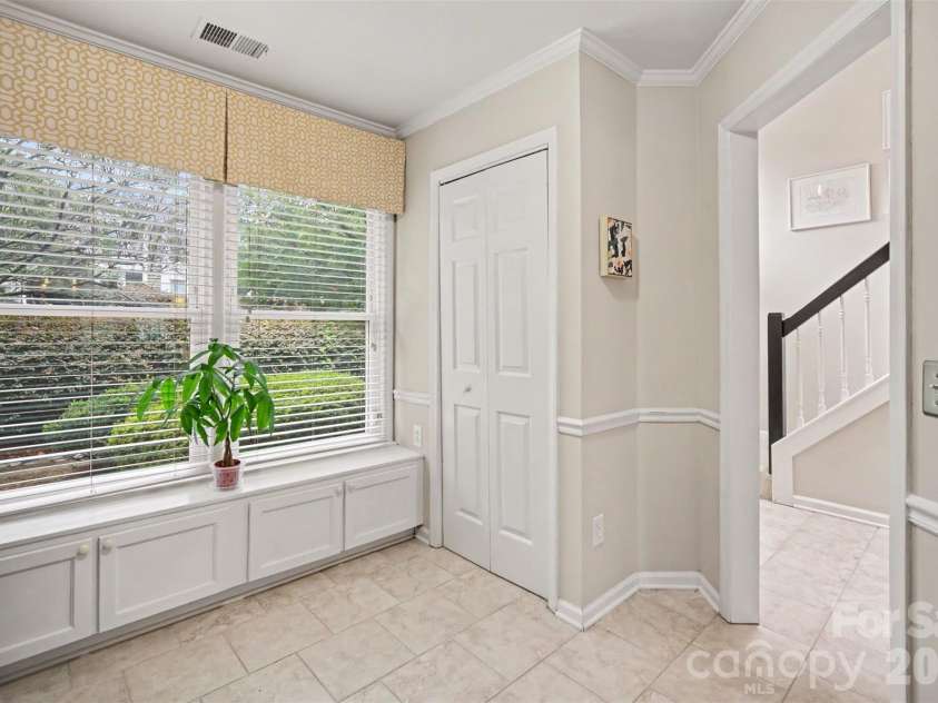 8205 Tradd Court, Charlotte, NC 28210.  MLS# CAR4408479, YatesRealty ID 43294. Built-in bench adds extra storage