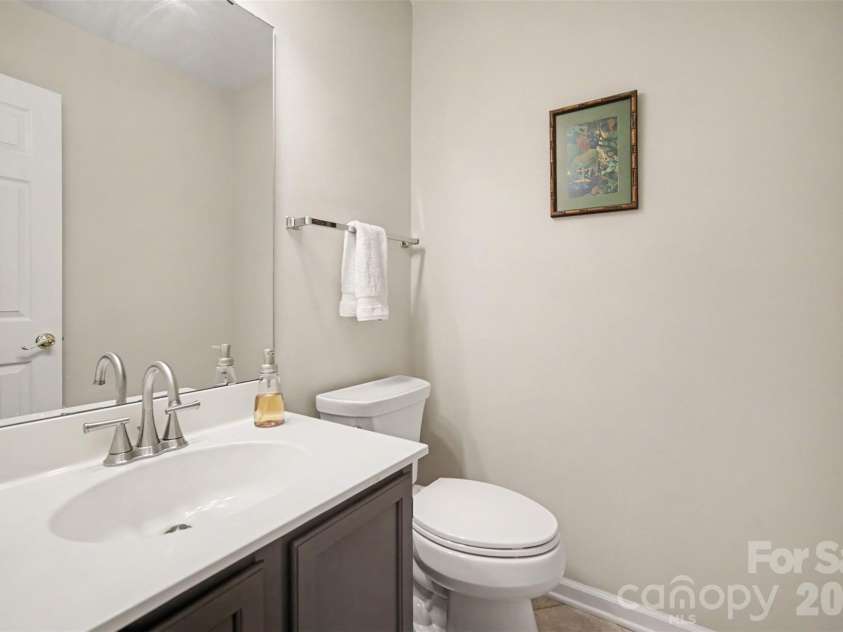 8205 Tradd Court, Charlotte, NC 28210.  MLS# CAR4408479, YatesRealty ID 43294. Convenient half bath on main level