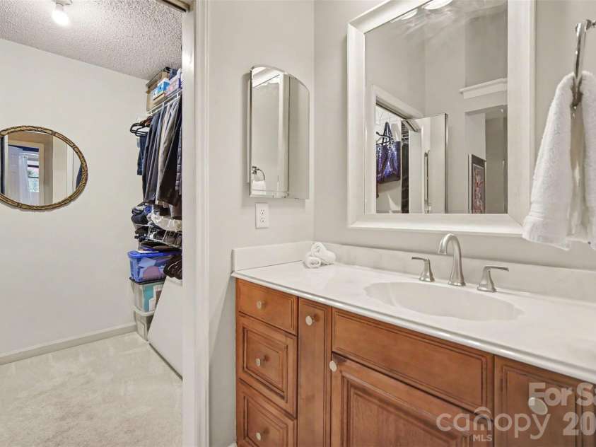 8205 Tradd Court, Charlotte, NC 28210.  MLS# CAR4408479, YatesRealty ID 43294. Primary bathroom with single vanity