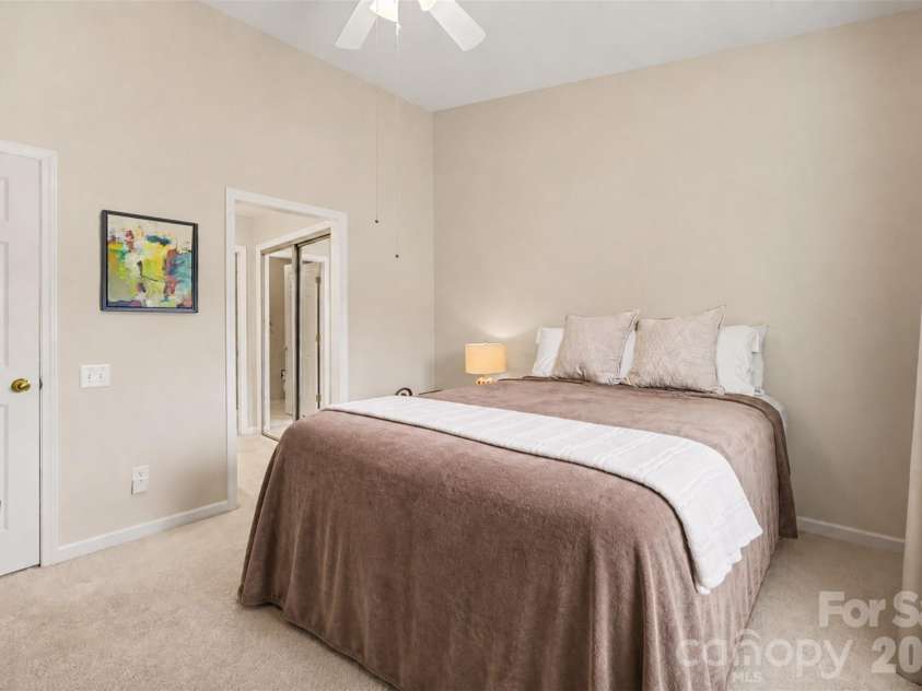 8205 Tradd Court, Charlotte, NC 28210.  MLS# CAR4408479, YatesRealty ID 43294. Second bedroom features a private ensuite