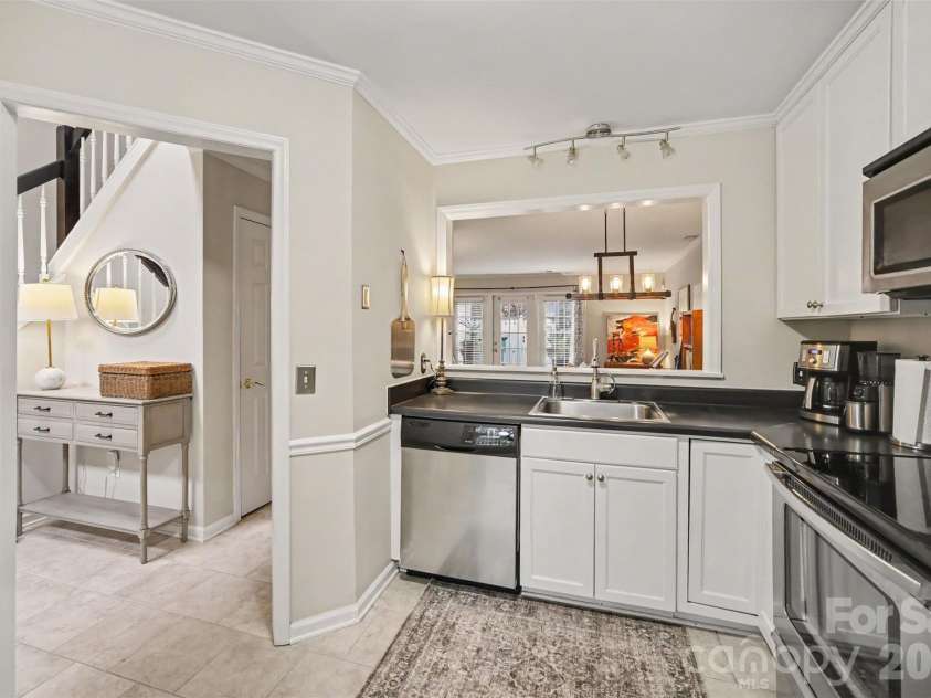 8205 Tradd Court, Charlotte, NC 28210.  MLS# CAR4408479, YatesRealty ID 43294. Tile flooring in kitchen and entryway