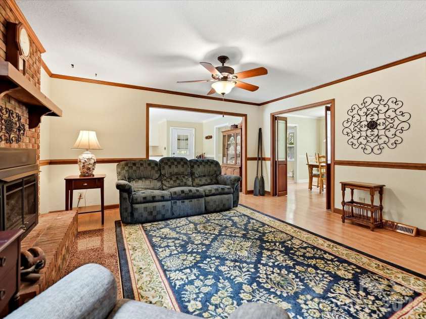 8812 Crestwood Drive, Mount Pleasant, NC 28124.  MLS# CAR4408679, YatesRealty ID 43303. Family room with fireplace