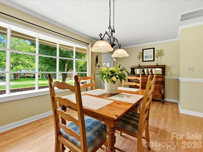 8812 Crestwood Drive, Mount Pleasant, NC 28124.  MLS# CAR4408679, YatesRealty ID 43303. Front living/dining space with bow window