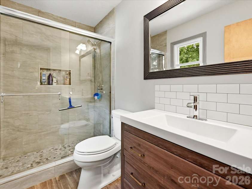 8812 Crestwood Drive, Mount Pleasant, NC 28124.  MLS# CAR4408679, YatesRealty ID 43303. Primary bath with upgraded fixtures and tile work