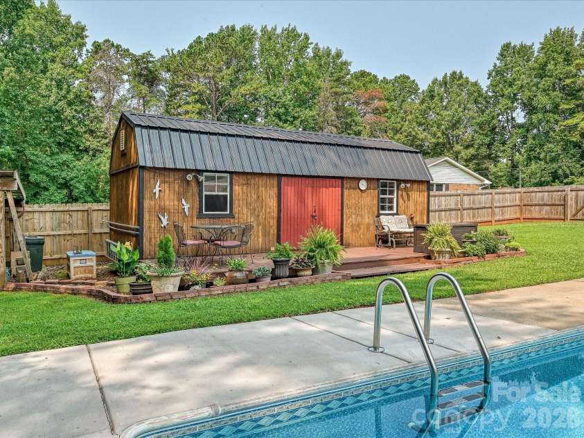 8812 Crestwood Drive, Mount Pleasant, NC 28124.  MLS# CAR4408679, YatesRealty ID 43303. Storage shed/workshop with 20amp service